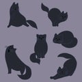 Silhouettes of black cats on a gray background